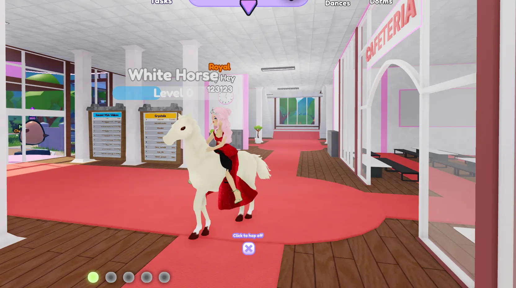 Girl riding a horse inside the school